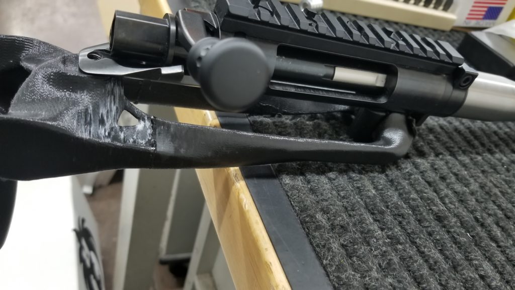 Side of action area of 3d printed rifle stock
